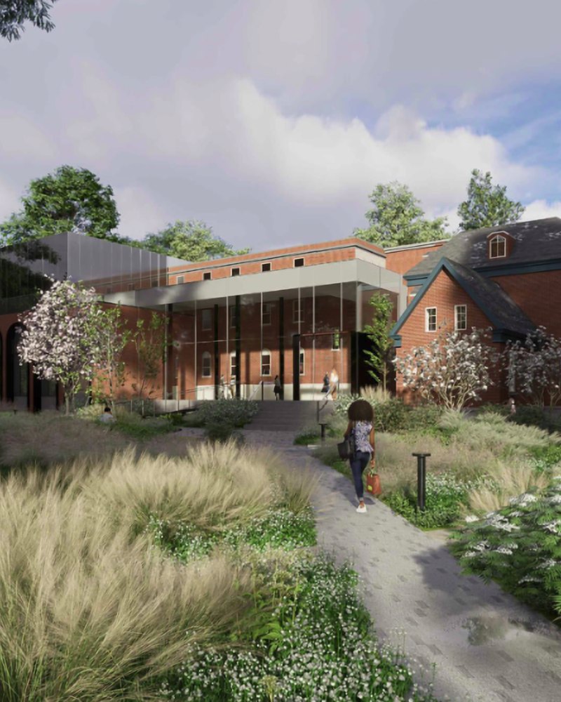 Rendering of FAR du Grand Montréal, a red-brick building with a glass addition